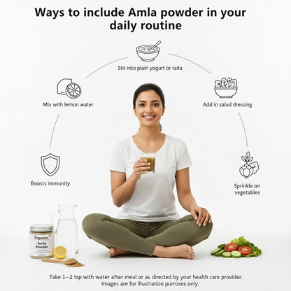 Woman holding a glass of amla powder drink with ways to include amla powder in daily routine on a white background.